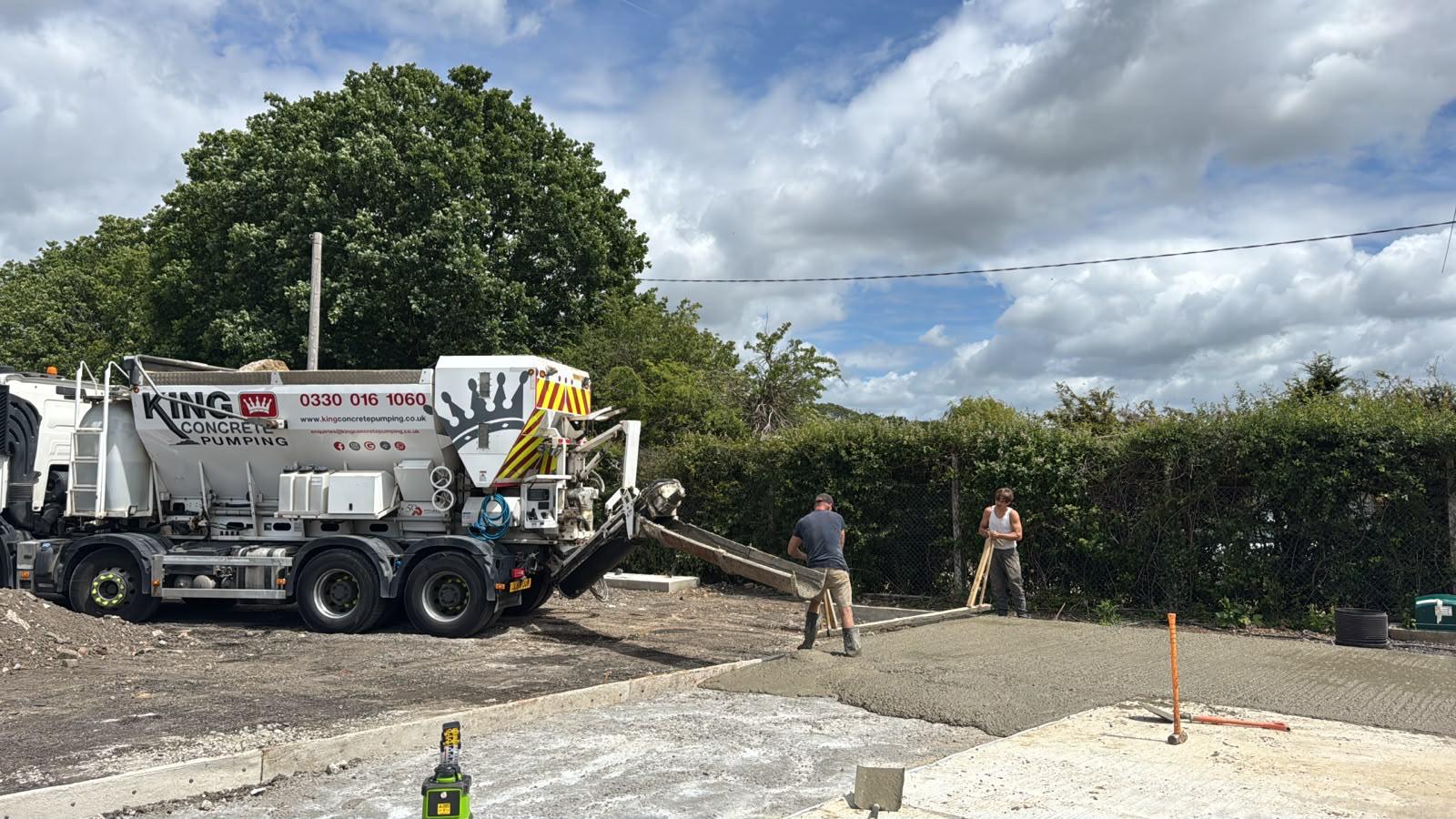 King Concrete Pumping crew placing concrete on a Clapham site